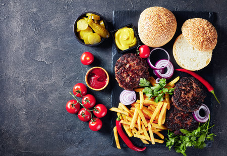 Hamburger Building Kit - freshly baked buns, fried beef burgers, pickles, ketchup, mustard, onion...