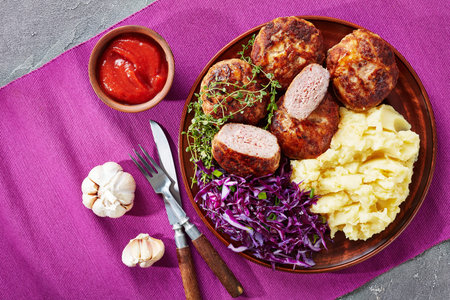 crepinette, fried flat sausages or patties of minced meat and wrapped in a caul fat, served on a ...