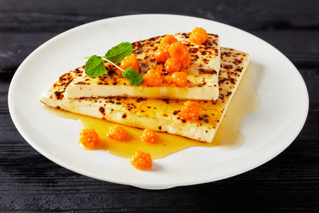 Leipajuusto, kaffeost, bread cheese, finnish squeaky cheese slices with cloudberry jam and fresh...