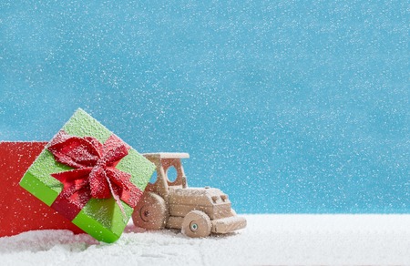 Christmas holiday concept with wooden toy and giftの写真素材