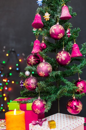 Decorated Christmas tree on blurred, sparkling and fairy backgroundの写真素材