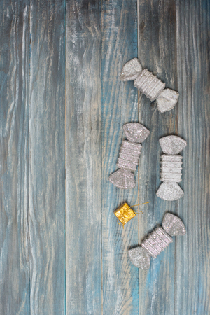 candy  on textured wooden backgroundの写真素材
