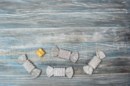 candy  on textured wooden backgroundの写真素材