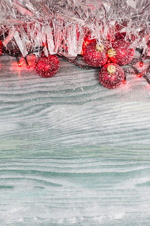 Snowflake Christmas Ornaments with fir greens against Rustic White Board Background with empty Room or space for copy, text, words. Horizontalの写真素材