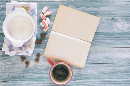 Top view of stuff table  coffee, phone, book, empty space, rustic tableの写真素材