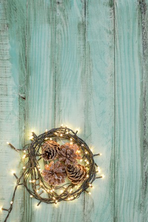 Nest with Christmas balls on rustic backgroundの写真素材