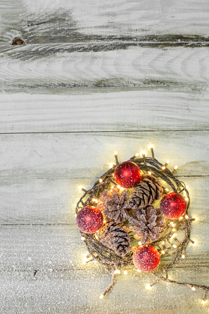 Nest with Christmas balls on rustic backgroundの写真素材