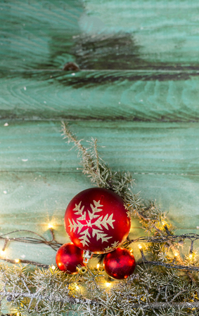 Nest with Christmas balls on rustic backgroundの写真素材