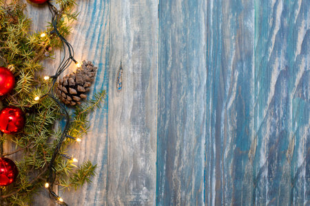 Christmas background. planked wood with lights and free text space