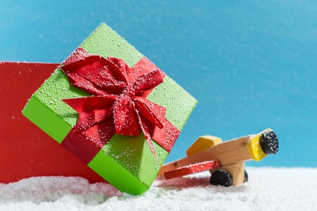 Christmas holiday concept with wooden toy and giftの写真素材