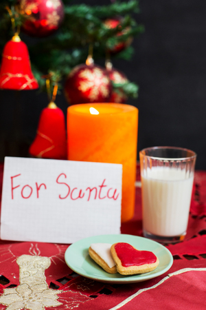 Christmas candles by the Christmas trees and fire, dear santaの写真素材
