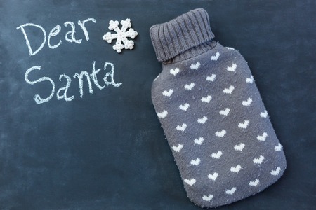 Christmas background with chalkboard and presents.Retro filter effectの写真素材