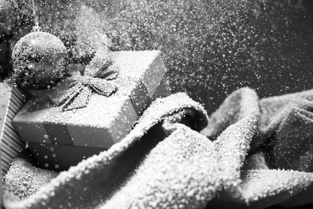 Red, Christmas Decoration On White Snow, Christmas Gifts And Presents With red Ribbon. Vintage Background With Snowflakes And Tree. Festive Snowy Christmas Cardの写真素材
