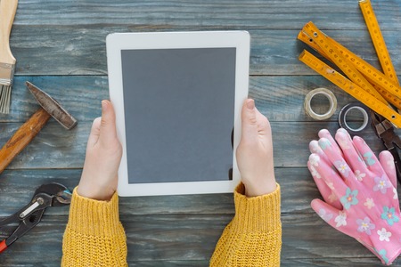 Carpenter's table with digital tabletの写真素材