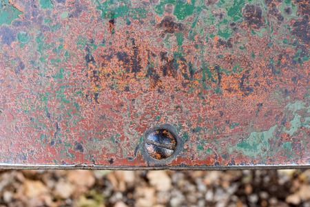 grunge chipped paint rusty textured metal backgroundの写真素材