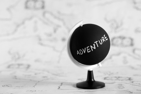 Planing to travel, adventure letters on chalk globeの写真素材