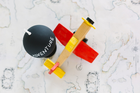 Globe and airplane toy with copy spaceの写真素材