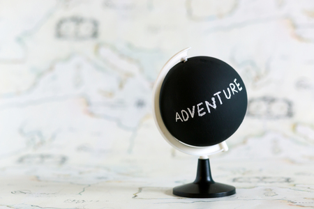 Planing to travel, adventure letters on chalk globeの写真素材