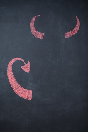 Devil's horns and tail. Doodle style, chalkboardの写真素材