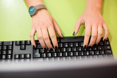 female hands on a keyboardの写真素材