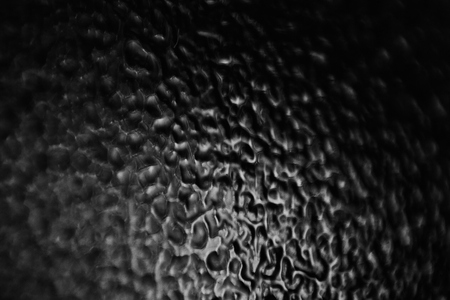 Glass texture back illuminated, macro of abstract glass textureの写真素材