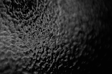 Glass texture back illuminated, macro of abstract glass textureの写真素材