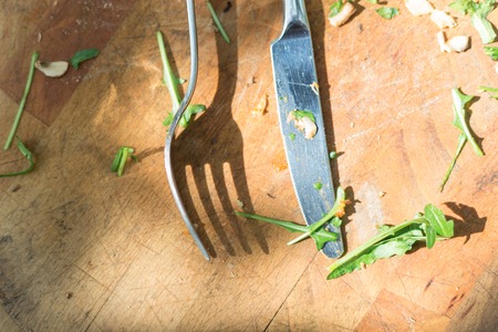 Empty wooden dish after food on wooden tableの写真素材