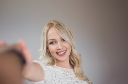 Beautiful model with wide smile.の写真素材