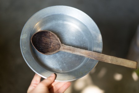 Vintage plate and spoon - rustic food conceptの写真素材