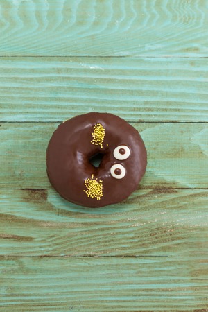 fresh donut on wooden table topの写真素材