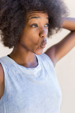 girls have fun with her afro hairの写真素材