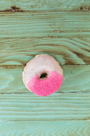 fresh donut on wooden table topの写真素材