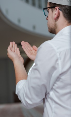 Religious muslim man praying inside the mosqueの写真素材