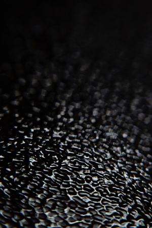 Glass texture back illuminated, macro of abstract glass textureの写真素材