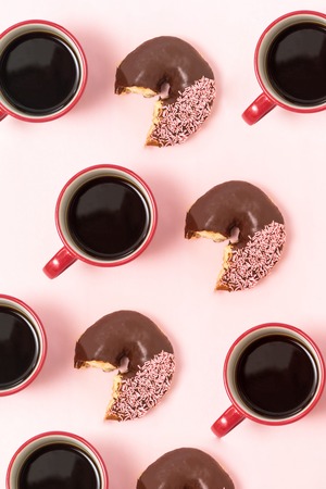 lots of donuts in rows, pattern made of donutsの写真素材