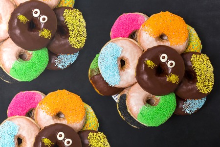 Top view, flat lay, donuts on chaalkboardの写真素材
