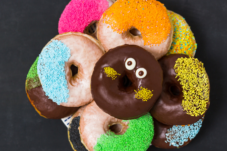 Top view, flat lay, donuts on chaalkboardの写真素材