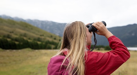 hiking woman enjoy the beautiful view at mountain peakの写真素材