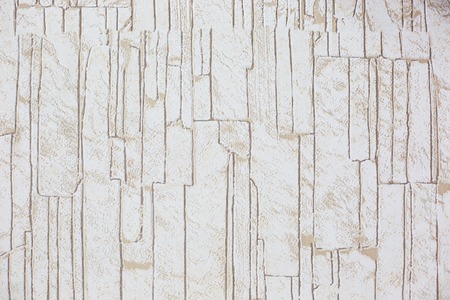 pattern gray color of modern style design decorative uneven cracked real stone wall surface with cementの写真素材