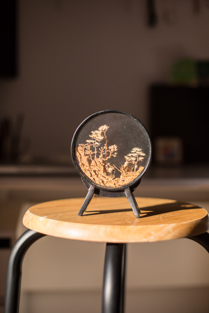 Wooden chair with a backrest in natural lightの写真素材