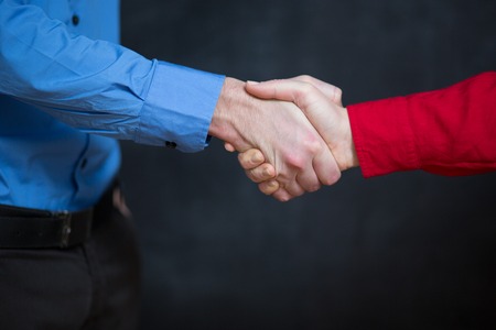 handshake two hands for men and womenの写真素材