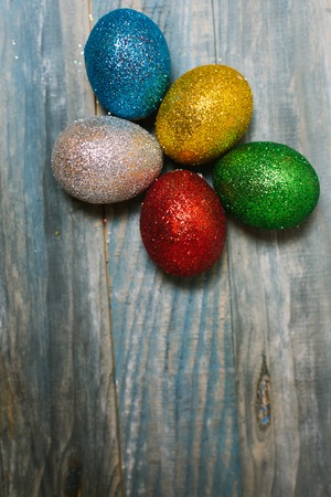 Easter eggs on wooden backgroundの写真素材