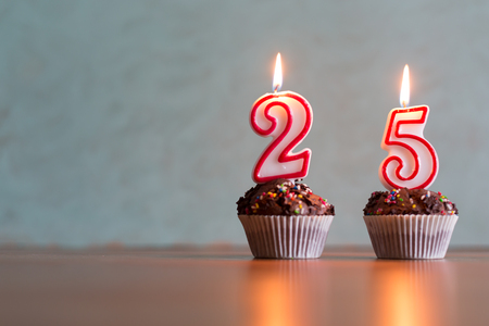 Birthday candles celebrating 25th birthdayの写真素材