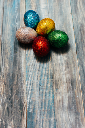Easter eggs on wooden backgroundの写真素材