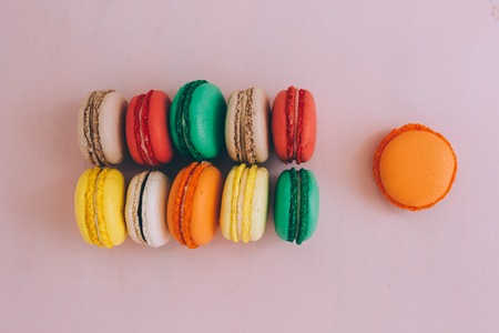 traditional french colorful macarons in a rowsの写真素材