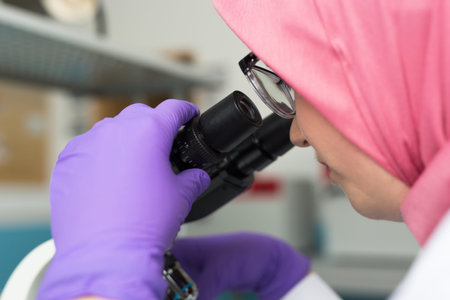 muslim lab worker doing an analysis
