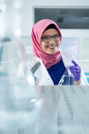 muslim lab worker doing an analysisの写真素材