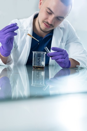 Cheerful young researchers are working in labの写真素材