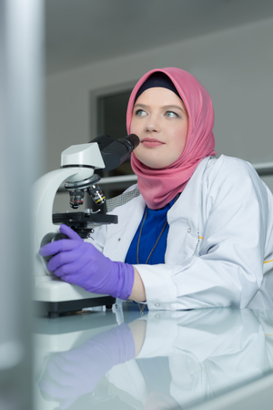 muslim lab worker doing an analysisの写真素材