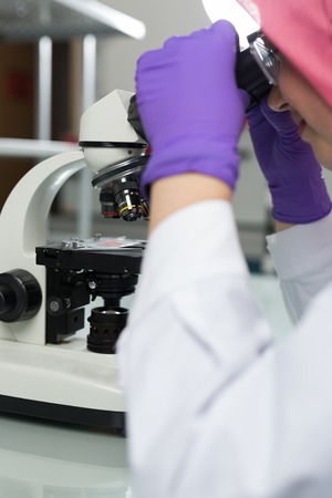 muslim lab worker doing an analysisの写真素材